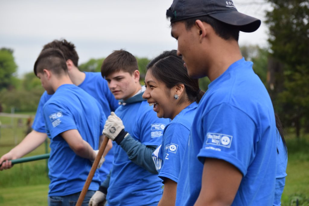 Dozens of students helped landscape, garden and paint at Leila Arboretum on May 17 for Youth Day of Caring.