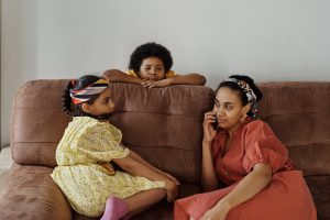 Family sitting on couch